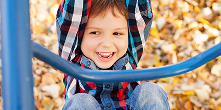 Boy playing on playground